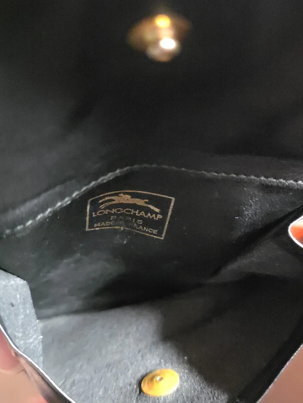 Longchamp Black and Gold Printed Leather Wallet
